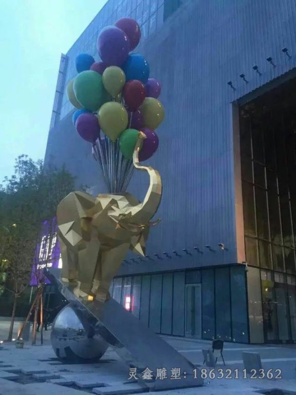 不锈钢大象踩翘翘板雕塑