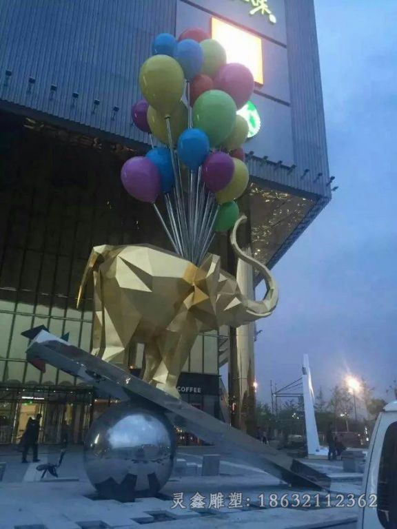 不锈钢大象踩翘翘板商场雕塑